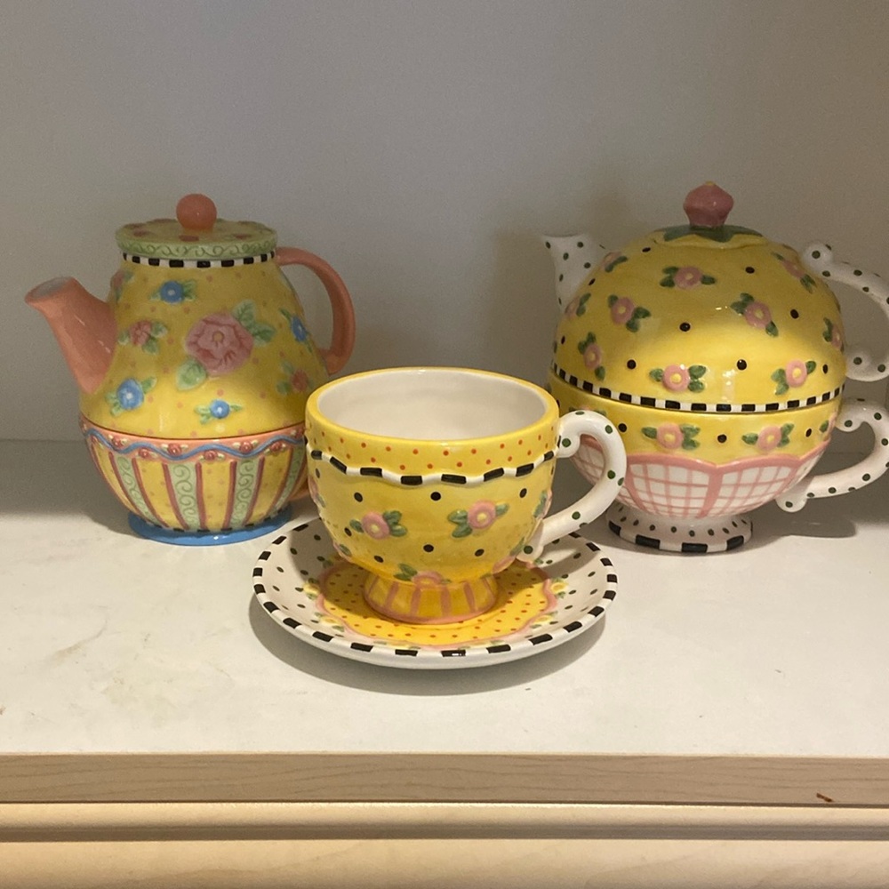 ME collectors teapots and teacup.